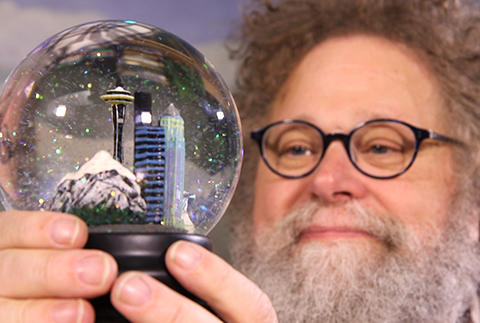 Knute Berger with snow globe