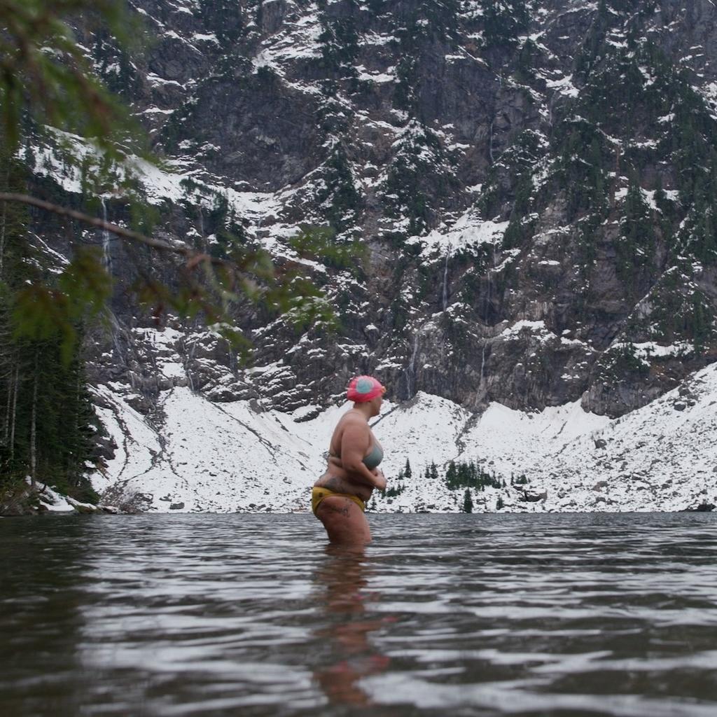 Melissa Kegler about to dive into a lake