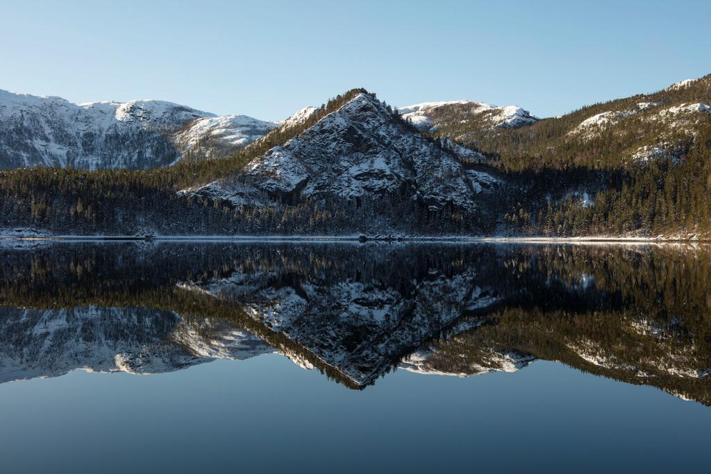 lake with mountain in the background