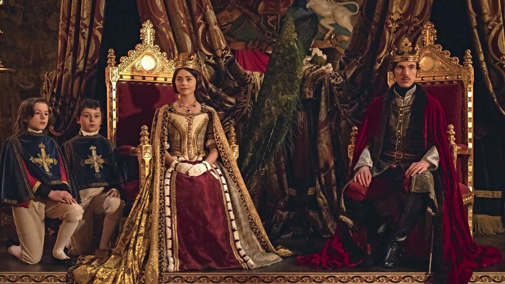 Queen Victoria and Prince Albert sit on gilded thrones in royal attire.