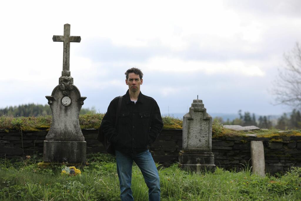 Adam Mezes in cemetery 